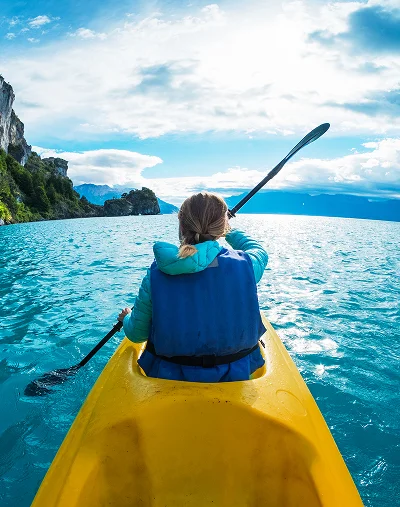 a person in a kayak on the water