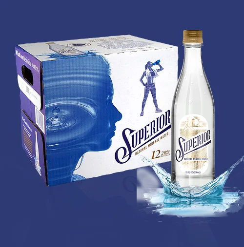 a bottle of water splashing out of a box