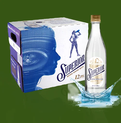 a bottle of water splashing out of a box